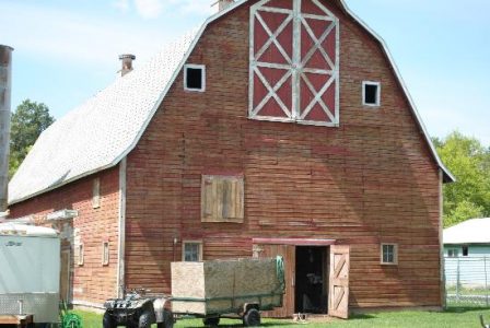 Painting a Big Red Barn Image